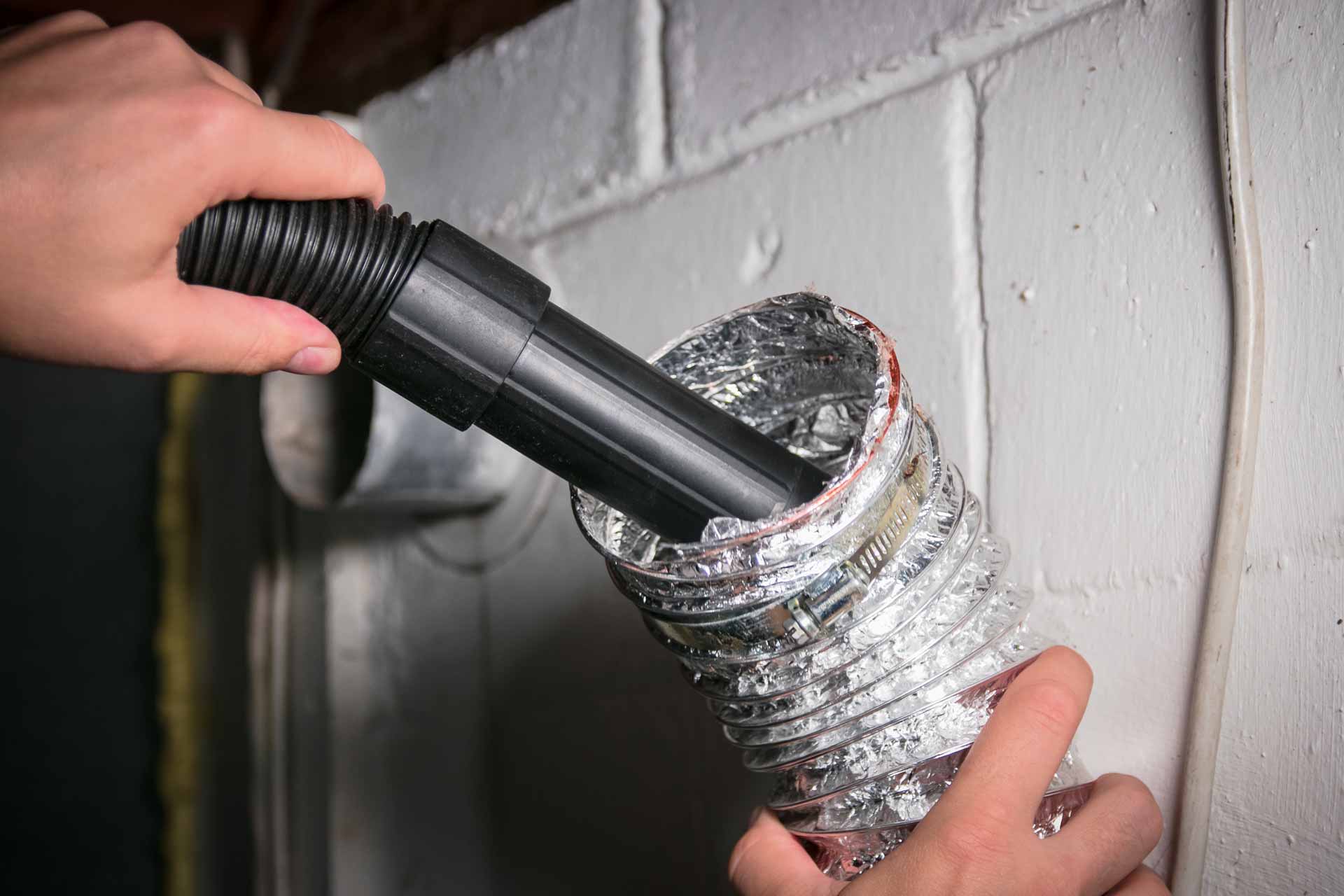 Vacuuming lint out of a dryer vent